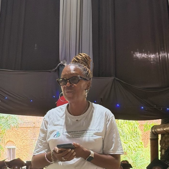 Regina Cromwell speaking at a graduation ceremony in Kenya